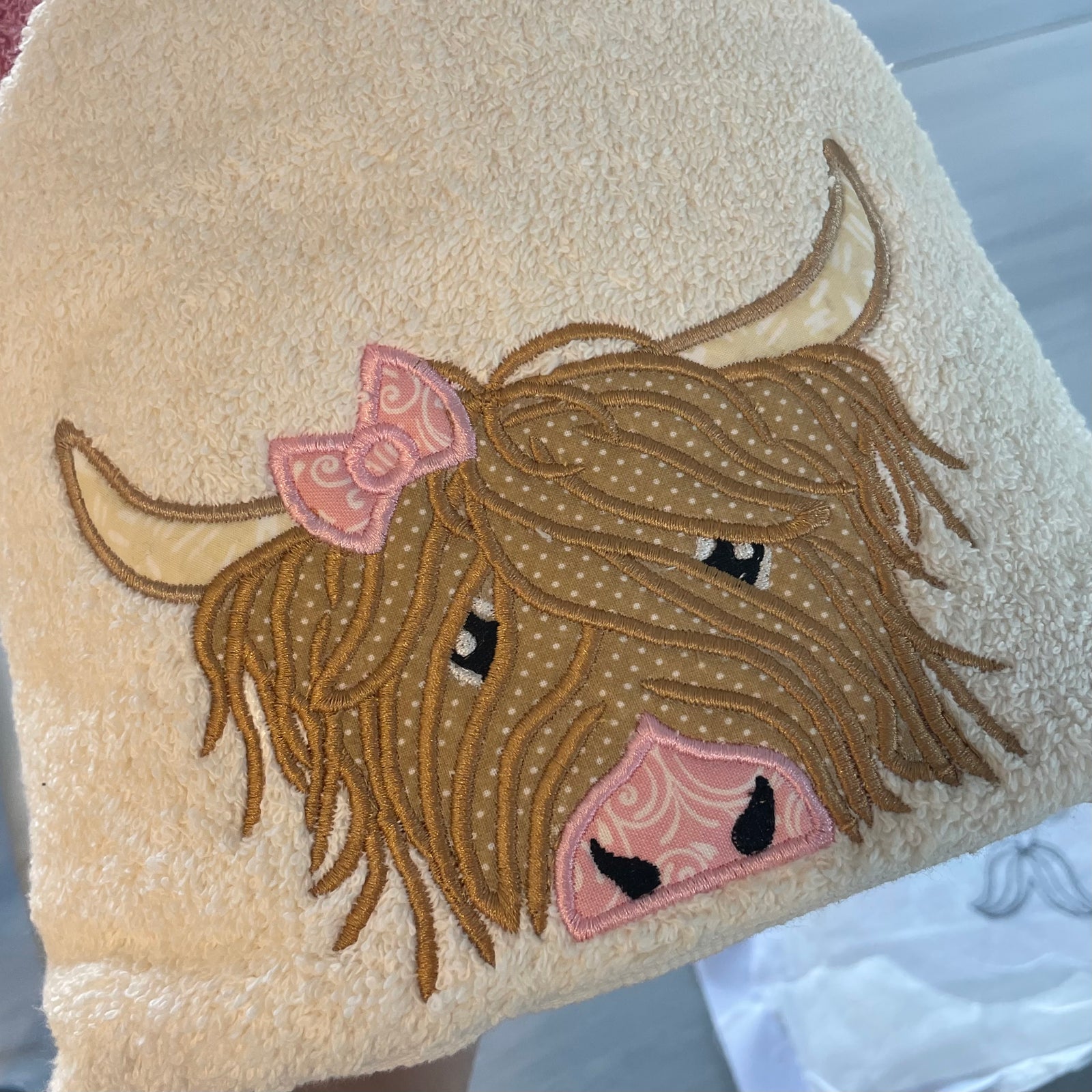 Highland Cow with Bow Peeker Hooded Towel