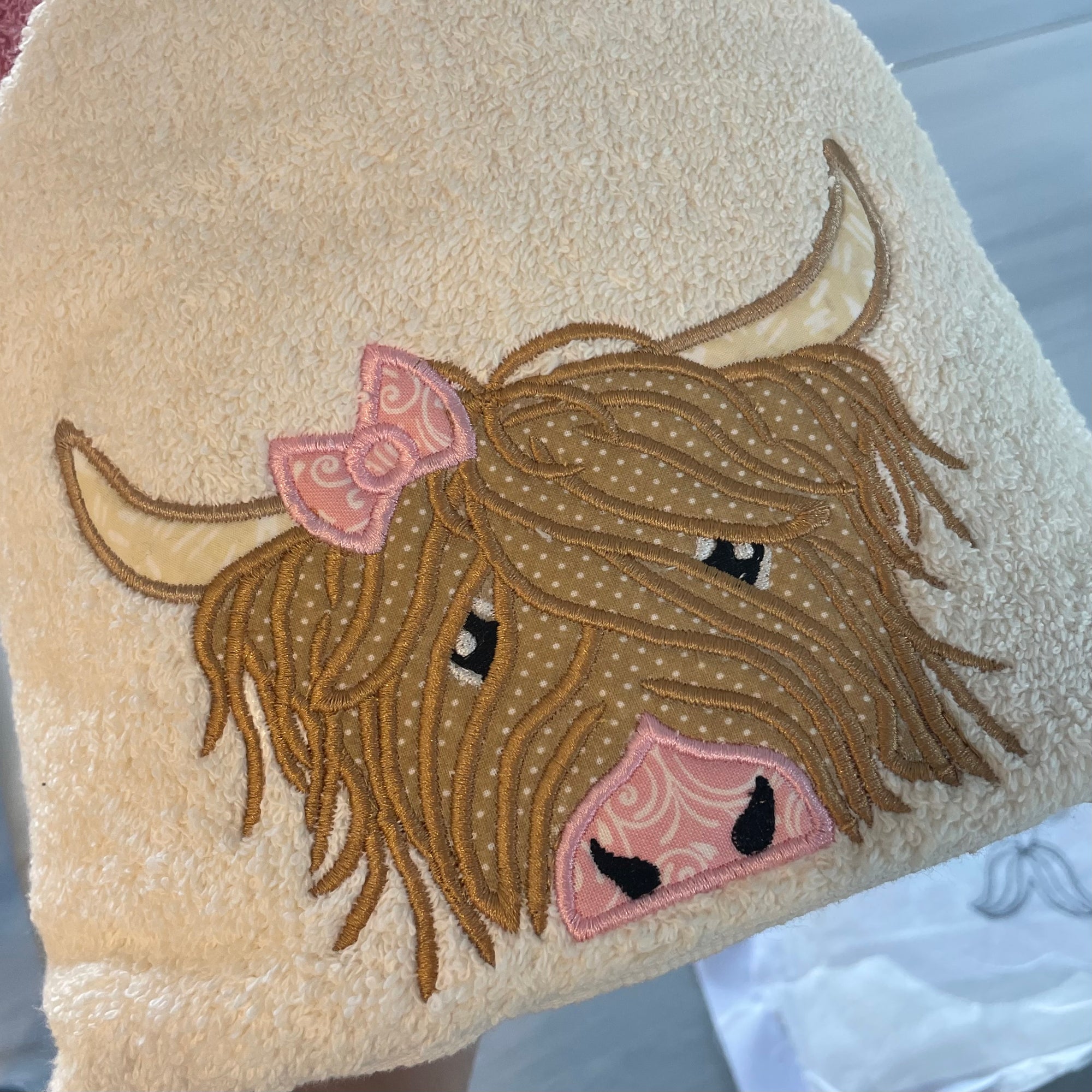 Highland Cow with Bow Peeker Hooded Towel