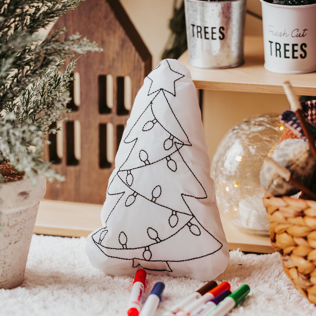 Tiny Owls Gift Co Christmas tree doodle pillow with washable markers in front