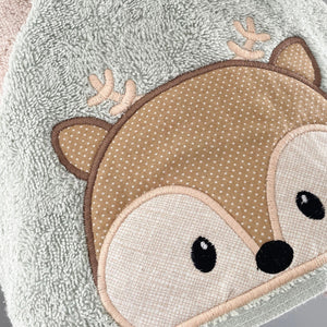 Pale green towel hood with a woodland deer face appliqued