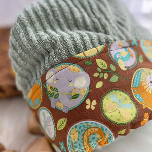 Fabric with elephant pattern and green textured material