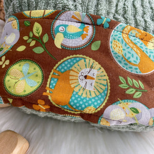 Fabric with animal pattern on a brown background