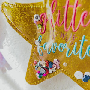 Rainbows & Unicorns Birthday Banner gold glitter closeup with sequins inside banner pieceTiny Owls Gift Co