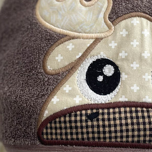 Close-up of an appliqued moose face on a kids hooded towel
