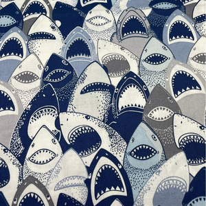 toothy shark faces in shades of blue grey and white